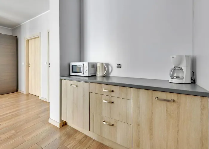 Grand - Davos Szafarnia River View